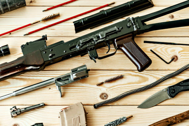 istock Gunsmith's working table for gun cleaning and maintaining 1426237777