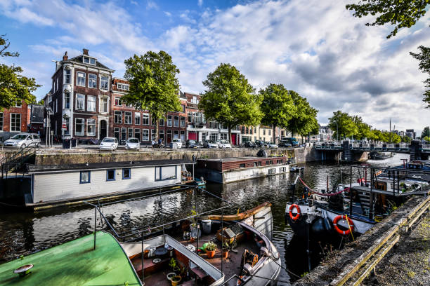 istock Beautiful Boats In Groningen Canal 1426243202