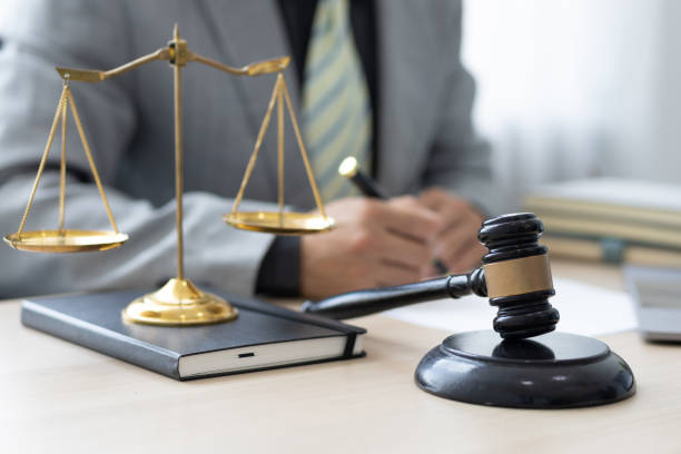 istock Attorney working on a desk in a law firm. 1426252262