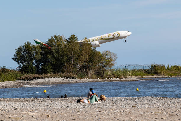 Plane takeoff by the sea of Nice stock photo