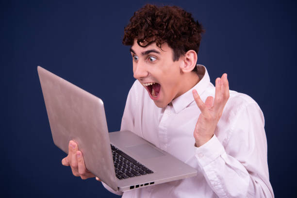 istock Funny attractive guy is watching a movie. 1426258226