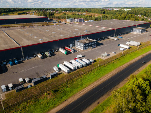 istock Logistics distribution hub. Trucks parking and loading area. Aerial shot 1426258438