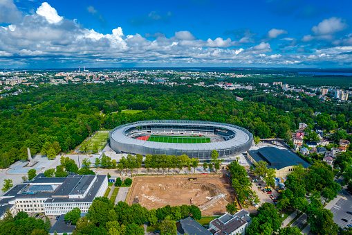 Newly reconstructed Kaunas Darius & Girenas football stadium, largest in Lithuania. Aerial view photo. Multi-use stadium located in Azuolynas park in Zaliakalnis district
