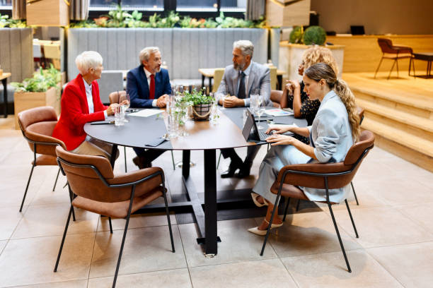 istock Group of businesspeople deep in discussion. 1426263464