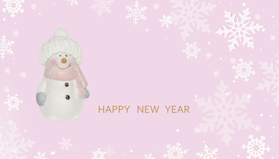 Merry Christmas background with snowman and snowflakes. pink and white Christmas decorations