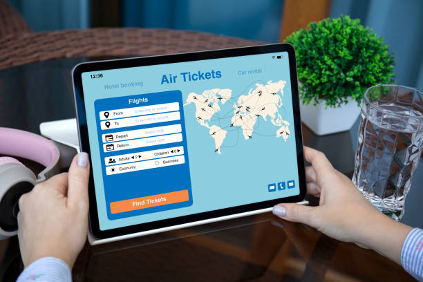 istock female hands holding computer tablet with application searching air tickets 1426265638