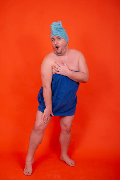 istock Funny guy takes a shower. Drag queen is wet. 1426268615