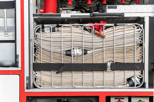 Fire hoses neatly folded and packed - ready for the next use