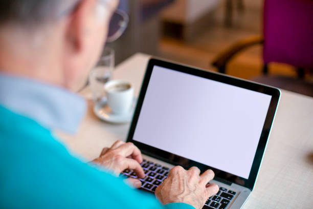 istock Senior man typing on laptop 1426270164