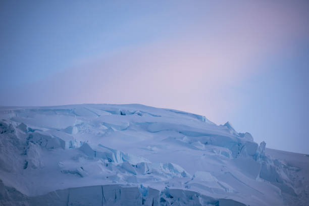 istock Morning light over a mountain on Gerlache Strait 1426273688