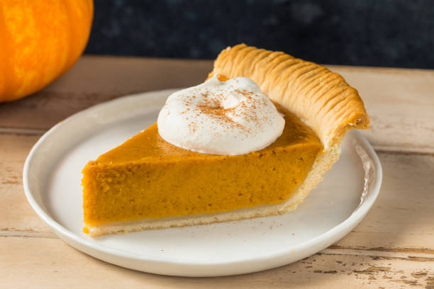 Homemade Thanksgiving Pumpkin Pie stock photo