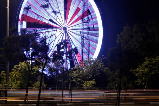 istock Blurred light lines ferris wheel antalya amusement park 1426280017