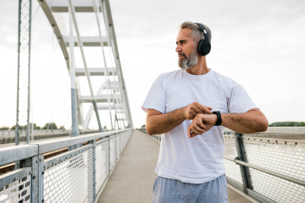istock Senior Athlete check fitness tracker after training 1426280795