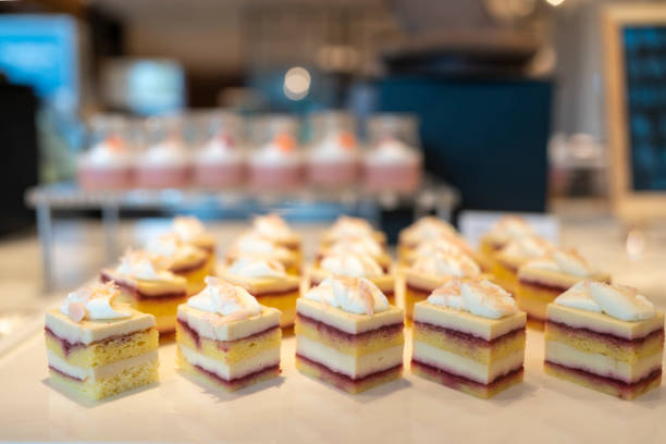 istock Cute cake on the shelf in a bakery 1426289308