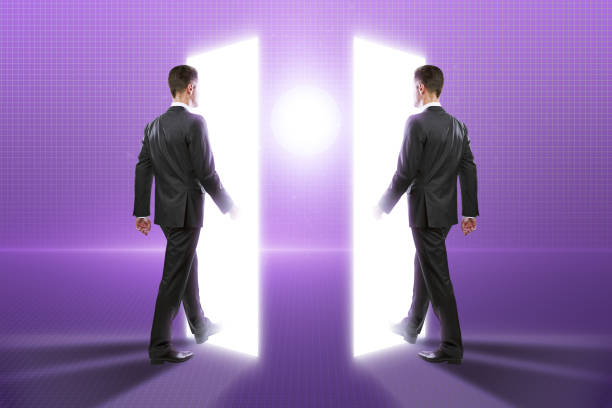 istock Side view of two young men walking into metaverse world on glowing background. Meta, technology and innovation concept. 1426289460
