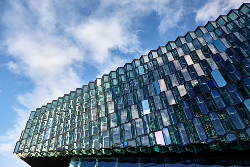 The Harpa Concert Hall modern architecture glass facade in Reykjavik, Iceland.