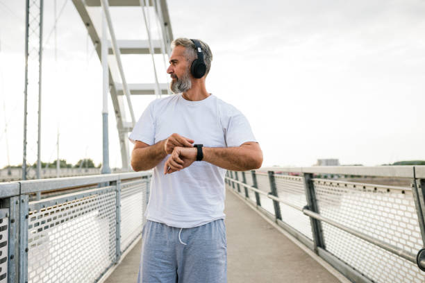 istock Senior Athlete check fitness tracker after training 1426291595