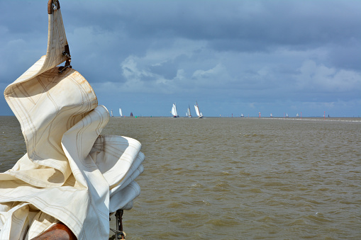 Sailing on Wadden Sea on yacht
