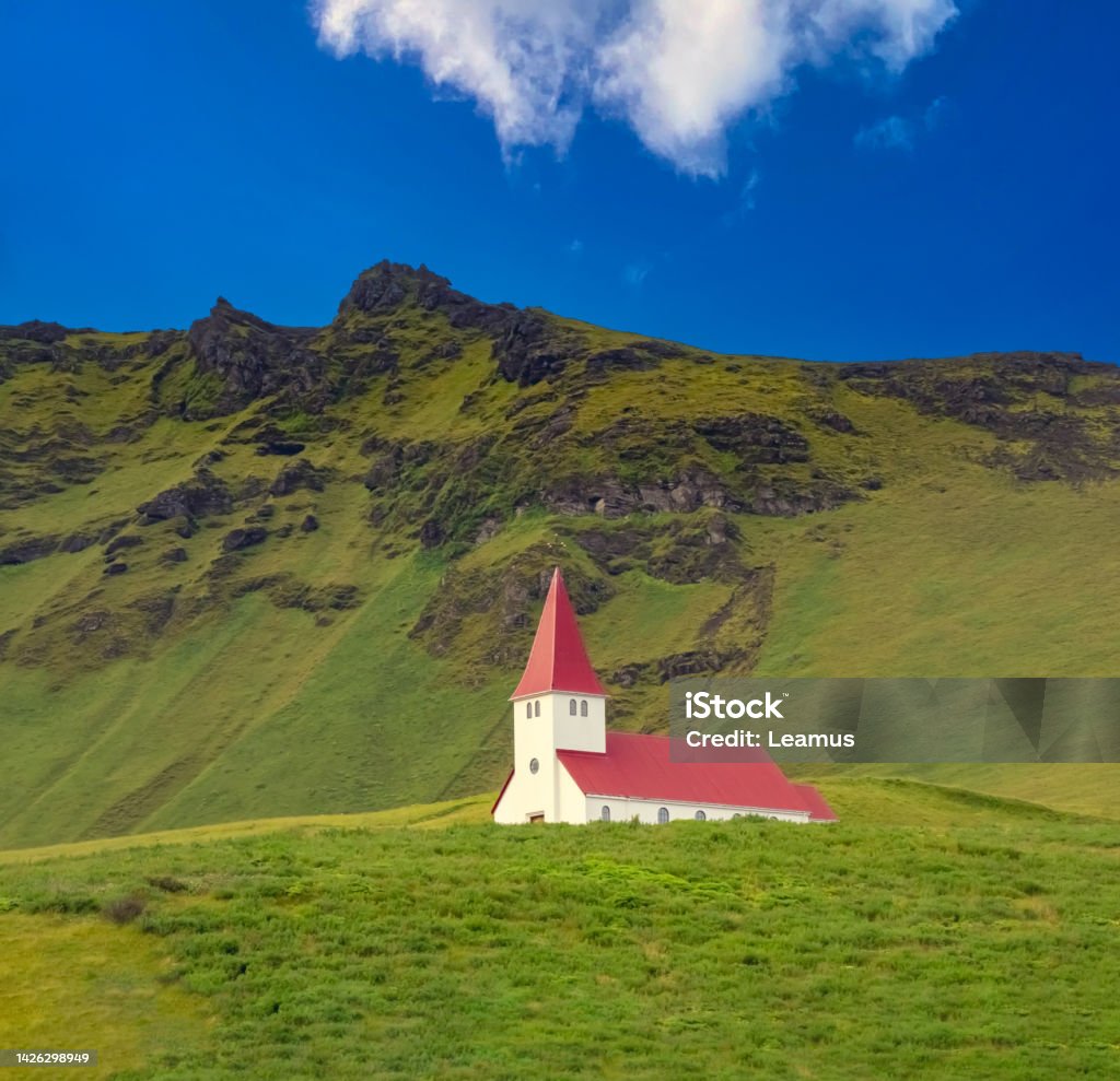 Reyniskirkja Church located on a hill overlooking the remote seafront village of VÃ­k Ã­ MÃ½rdal, Southern Iceland Reyniskirkja Church located on a hill overlooking the remote seafront village of Vik y Myrdal, Southern Iceland Adulation Stock Photo