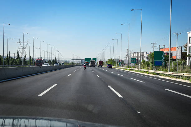 istock driving on highway towards the city 1426304293