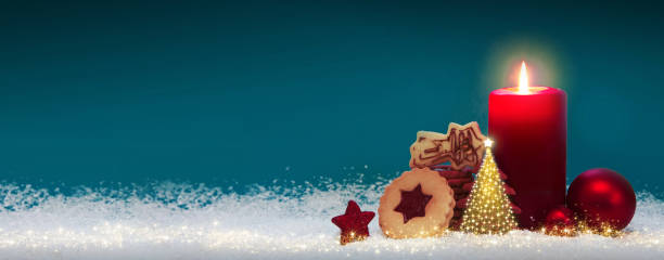 istock Christmas background with Advent candle and red decoration 1426304545