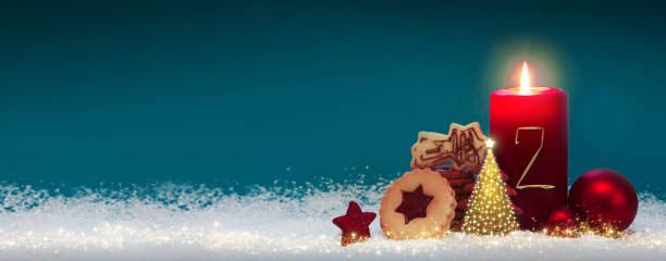 istock Second Advent. Christmas background with Advent candle and decoration. 1426304594