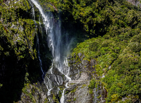 Windblow water fall, Milford Sound, New Zealand.