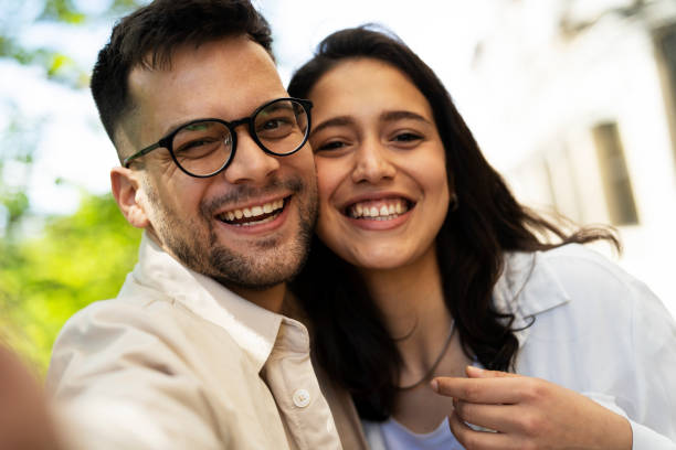 istock Boyfriend and girlfriend taking selfie photo 1426328450