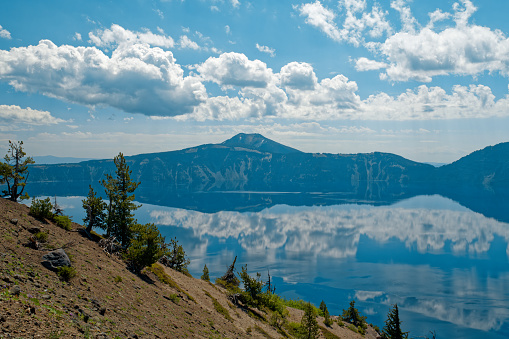 Crater Lake is a National Park famous for its lake in the center of a volcano with super clear, deep blue water. It is an absolutely stunning part of Oregon