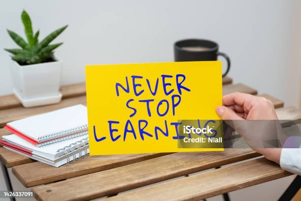 Sign Displaying Never Stop Learning Business Showcase Continue To Improve And Empower Your Boundaries Stock Photo - Download Image Now
