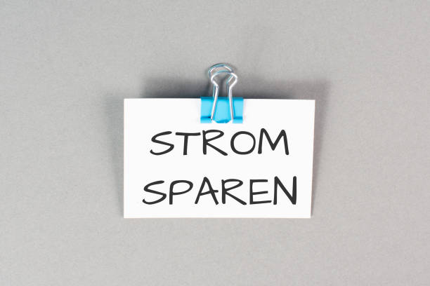 istock Save electricity is standing in german language on the papers, regulations for the winter, sanctions against russia 1426337452