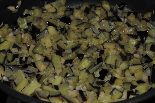 istock Fried aubergines with onions and garlic. 1426340434