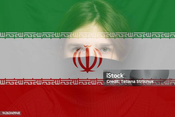 Defocus Young Woman Protest In Iran Conflict War Over Border Country Flag Woman Low Rights Male Hands Iranian Women Violence Iran Women Activism Out Of Focus Stock Photo - Download Image Now