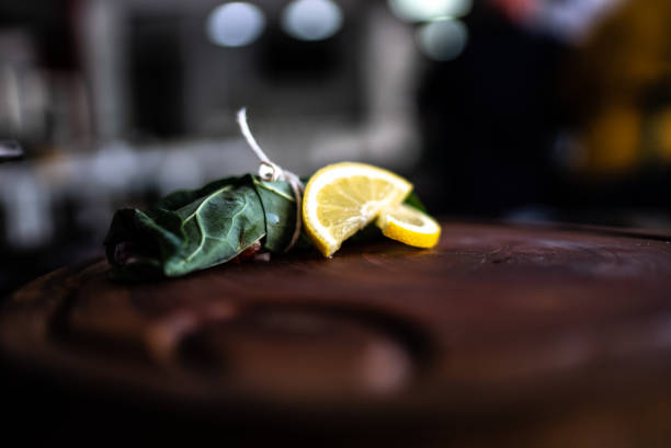 Plate of stuffed grape leaves with lemon slices
