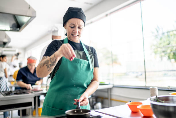 istock Mature woman cooking in the kitchen 1426346631