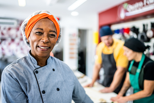 Portrait of a senior woman at the kitchen