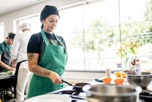 istock Mature woman cooking in the kitchen 1426346871
