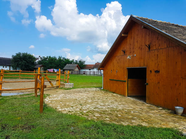 istock Wooden Barn at  sunny day 1426348724