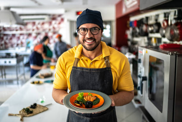 Man showing a meal he'd prepared
