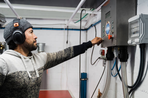 latin diver working inside filling station at diving workshop center - focus on man face - men latin american and hispanic ethnicity southern european descent mature adult imagens e fotografias de stock