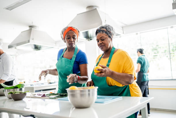 istock Senior women cooking in the kitchen 1426350404