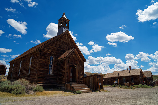 Rancho de Taos NM, USA - April 15, 2023: The San Francisco de Assisi Church is a Catholic Mission Church and an important historic building. The building is made from Adobe brick with Adobe mortar and plaster. It was built between 1772 and 1816.
