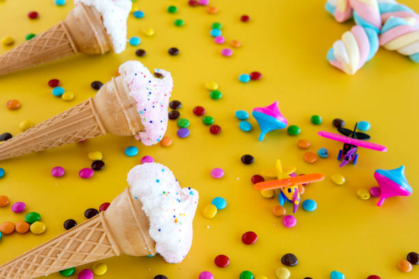 istock dry ice cream and plastic toys on yellow background 1426351285