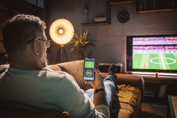 istock Watching soccer game at home 1426353274