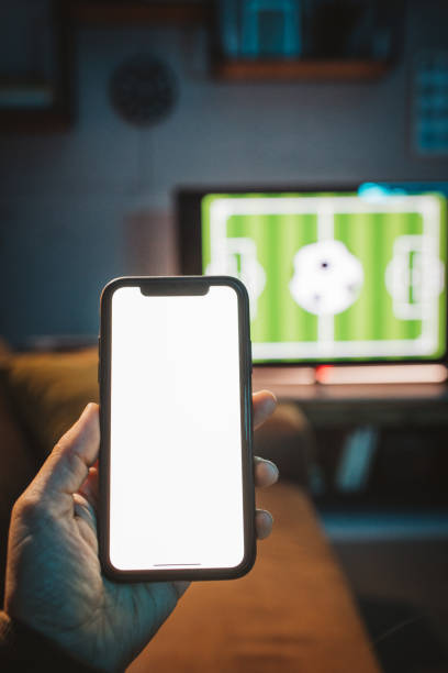 istock Watching soccer game at home 1426353341