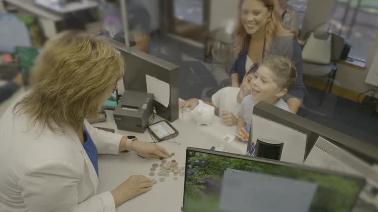 Mom teaching her sons about financial responsibility