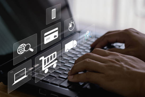 istock e-commerce and shopping online concept, Customer typing on computer laptop to input order with icon of trolley credit card delivery truck for online shopping and e-commerce from seller over internet. 1426362948