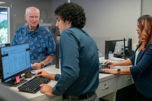 senior man at the bank - bank bank teller customer banking imagens e fotografias de stock