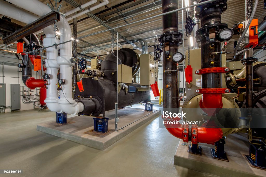 Compressor Room Compressors for large HVAC system. Air Conditioner Stock Photo