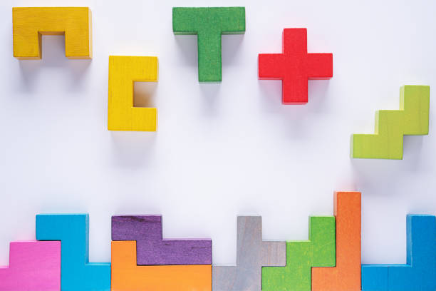 istock Top view on colorful wooden blocks folding on white background 1426366689